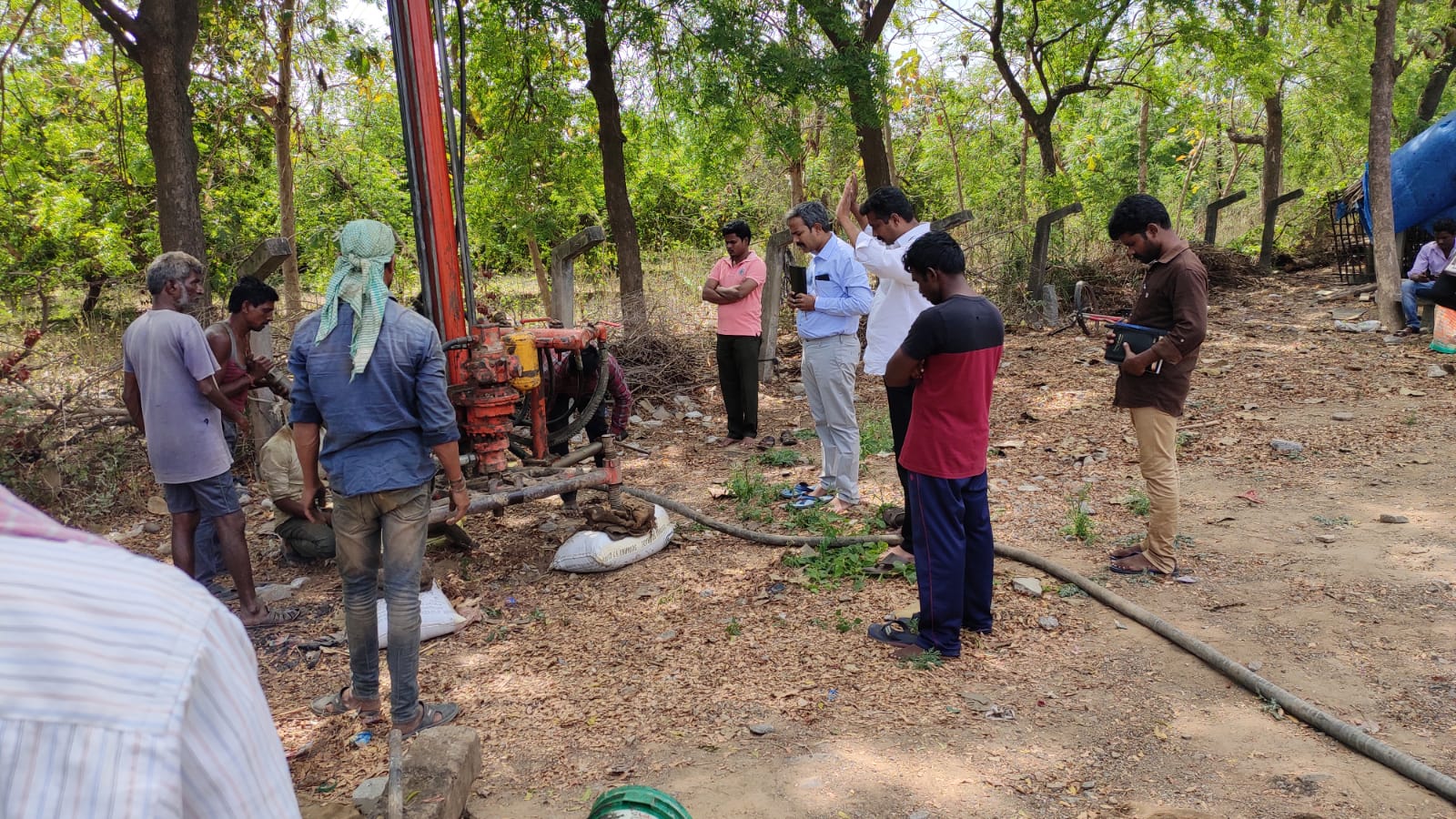 Villagers celebrating clean water from a newly built well
